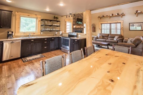 The dining area is nearby all the action and adjacent to the living room and kitchen