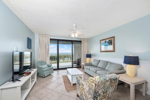 Spacious living room with a beautiful view, and plenty of seating. 