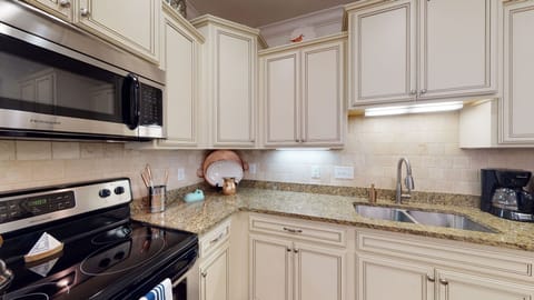 Lots of counter space and stainless steel appliances.