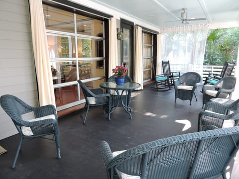 Outdoor, Southern porch with views of the palm trees and beautiful flowers