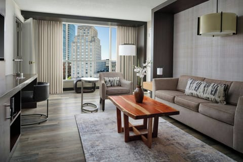Premium bedding, down comforters, in-room safe, desk