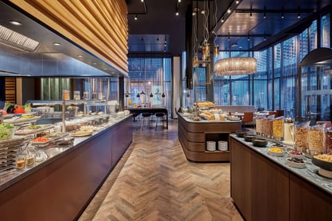 Daily buffet breakfast (CHF 40 per person)