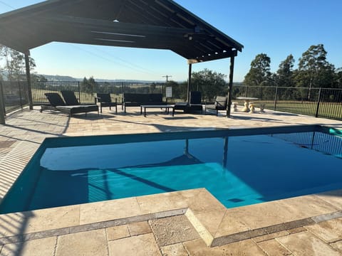Private Pool area, secure fencing. Day beds, lounges and marble table (14 sq m)