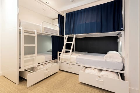 Family Room | Premium bedding, down comforters, desk, blackout drapes