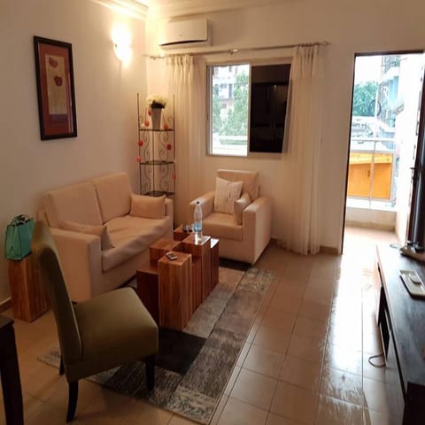 Classic Apartment, 2 Bedrooms | Living room | Flat-screen TV