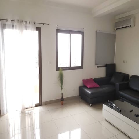 Classic Apartment, 3 Bedrooms | Living room | Flat-screen TV