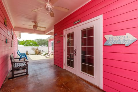 Relax in your private covered patio with rocking chairs and ceiling fans, where tropical breezes keep you cool.