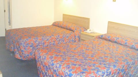 Standard Room, 2 Double Beds, Smoking | Desk, WiFi (free), bed sheets
