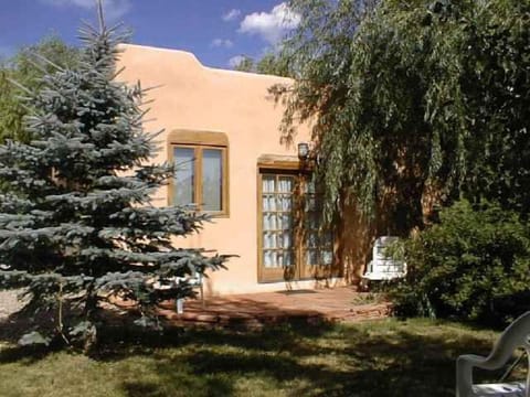 Front entry and flagstone patio summer view of Casita Bella