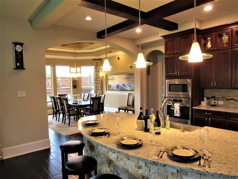 Right Side of Kitchen Overlooking Dining Room/Lake/Deck