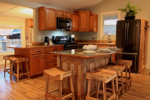 Well appointed gourmet kitchen with gas stove.