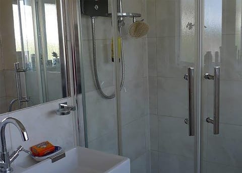 Shower, free toiletries, hair dryer, bathrobes