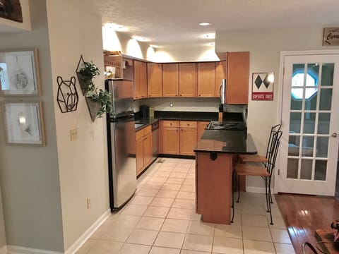 Full kitchen stocked with all cooking needs