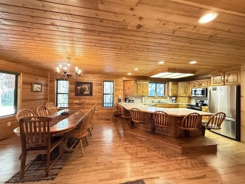 Full kitchen with appliances, dishes, and cooking essentials.