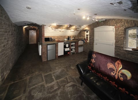 Apartment, 1 Bedroom | Living room | Flat-screen TV