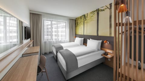 Hypo-allergenic bedding available, in-room safe, desk, laptop workspace