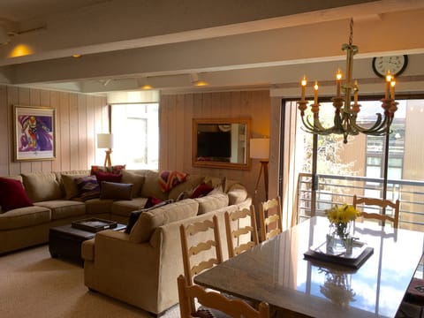 Dining Room boasts a large, marble table seating 10 and a balcony with a view.