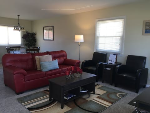 Living room with new sofa and chairs that make you feel right at home. 