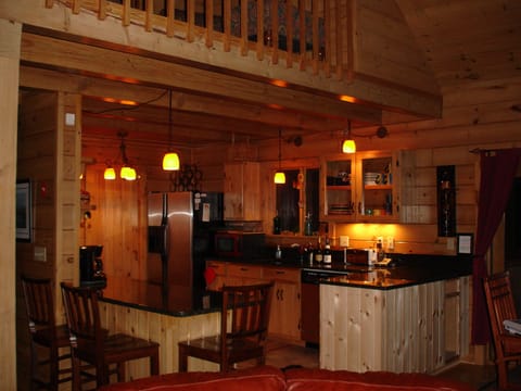 Open kitchen with plenty of room for prep. High end appliances and kitchen tools