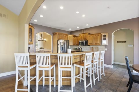 Plenty of seating at the counter in the fully stocked kitchen