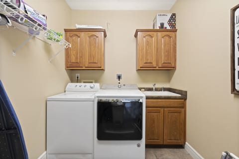 Main level pantry with washer and dryer
