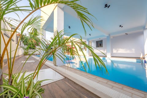 2 outdoor pools, pool umbrellas, sun loungers