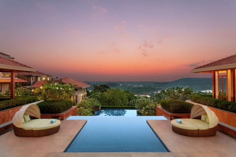 4 outdoor pools, open 8:00 AM to 9:00 PM, pool umbrellas, sun loungers