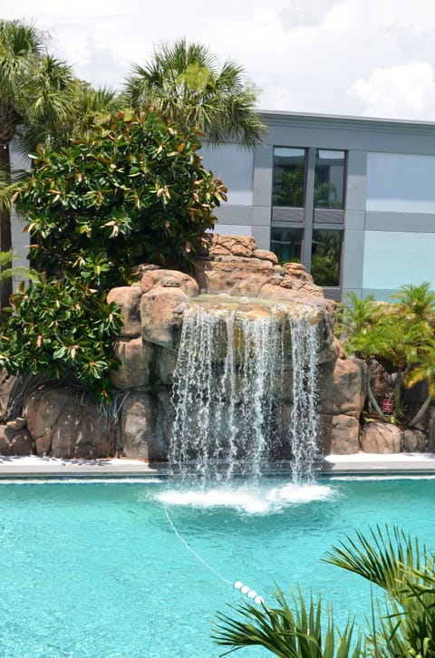 Outdoor pool, open 8:00 AM to 9:00 PM, pool umbrellas, sun loungers