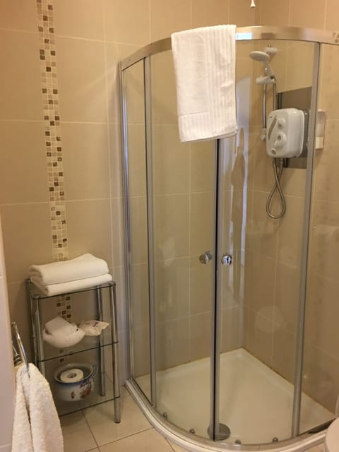 Shower, free toiletries, hair dryer, towels