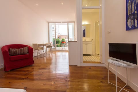 Apartment, 1 Bedroom, Balcony | Living area | Flat-screen TV