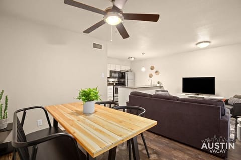 Dining area for four that is overlooking the living room