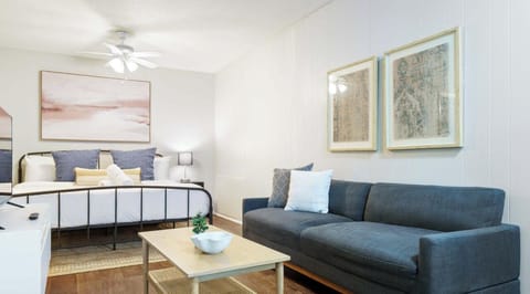 Studio apartment with comfortable king bed, sofa, and smart tv