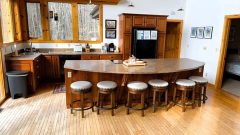 Your spacious kitchen island becomes the heart of your getaway, perfect for morning coffee or sharing meals with loved ones.