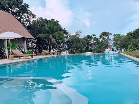 Outdoor pool, open 8 AM to 9:00 PM, pool umbrellas, sun loungers
