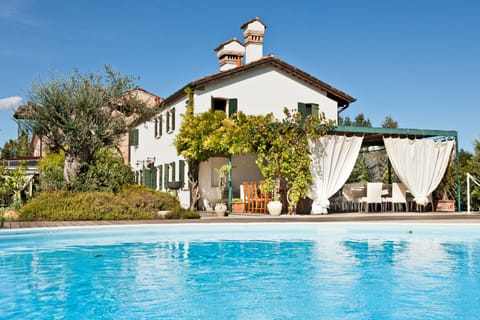 Seasonal outdoor pool, open 6 AM to 7 PM, pool umbrellas, sun loungers