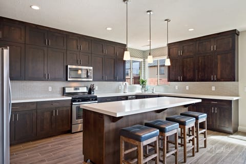 Fully stocked kitchen and plenty of counter space to prepare meals. 