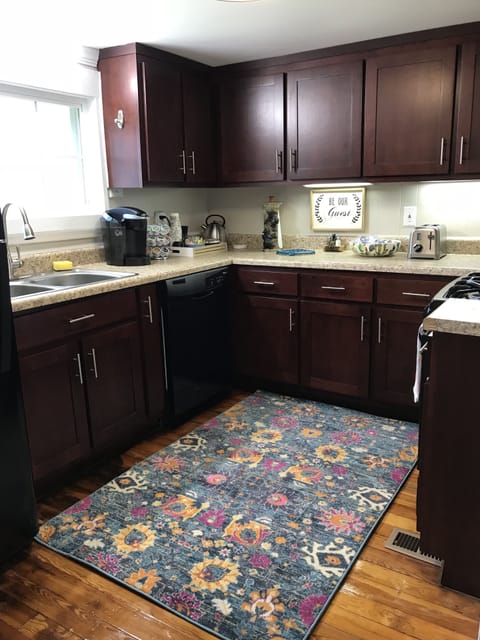 Keurig with coffee, tea, and condiments. Fruit & snacks, cooking basics.