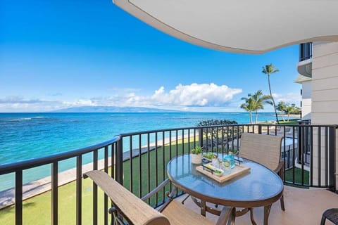 Enjoy alfresco dining with breathtaking views of the turquoise waters right from your balcony