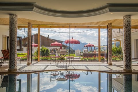 Indoor pool, open 7:00 AM to 7:00 PM, sun loungers