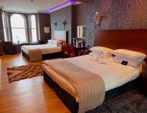 Family Room, 1 Bedroom, Beach View | Premium bedding, in-room safe, individually decorated