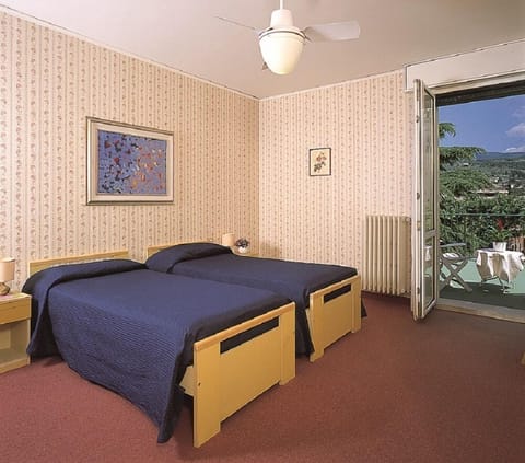 Double or Twin Room, Balcony | Minibar, in-room safe, desk, free WiFi