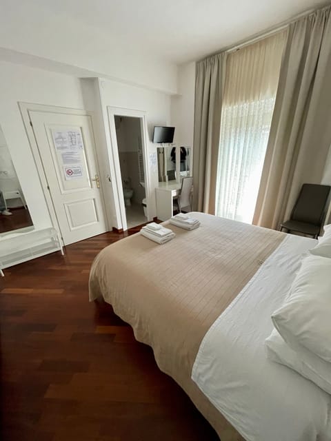 Standard Double Room, Private Bathroom, Garden View | Desk, laptop workspace, free WiFi, bed sheets