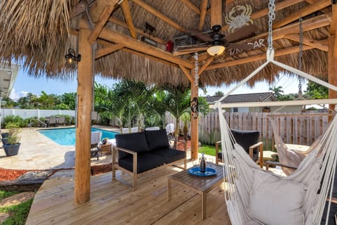 Beach House Retreat with Heated Pool, Tiki and Large Travertine Patio!