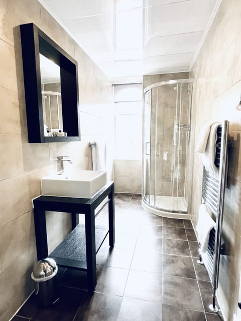 Shower, free toiletries, hair dryer, towels