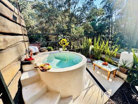 Family Room, Garden View | Private spa tub
