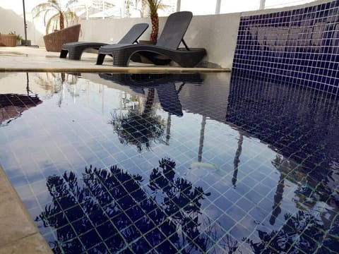 Outdoor pool, sun loungers