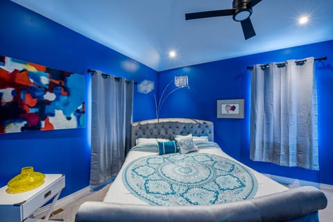 Bohemian master bedroom with giant king bed