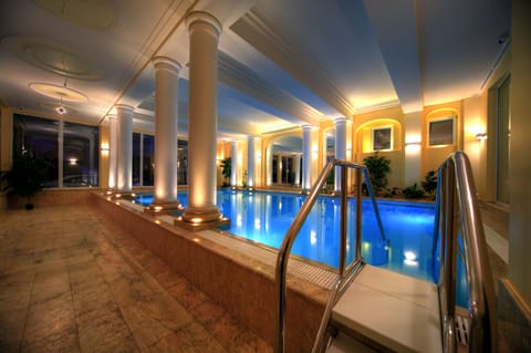 Indoor pool, open 8:00 AM to 9:30 PM, sun loungers