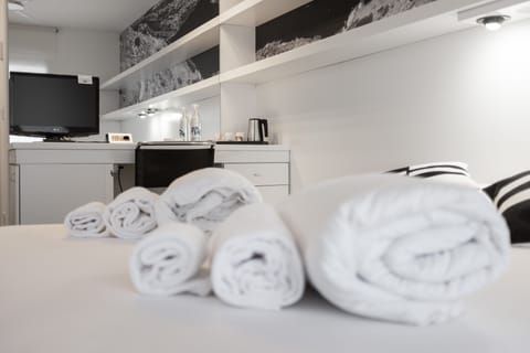 Egyptian cotton sheets, premium bedding, down comforters, minibar