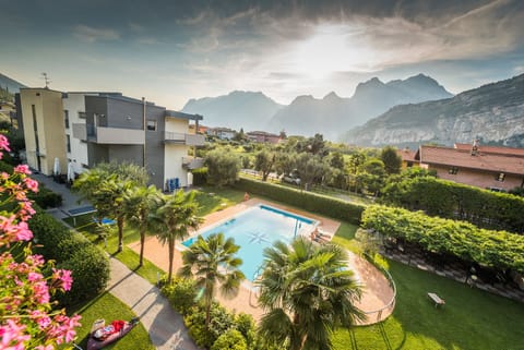 Outdoor pool, open 9:00 AM to 8 PM, sun loungers